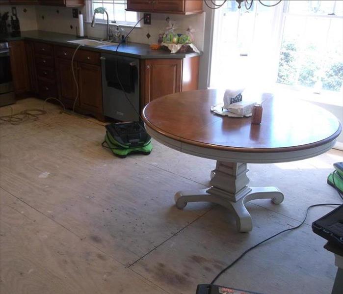 Removal of kitchen floor with added dryers to complete the floor drying process. 