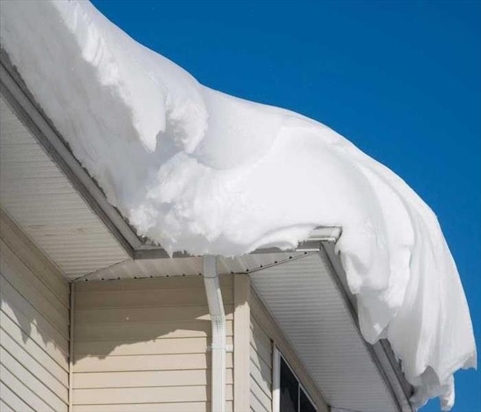 House roof with snow and Ice